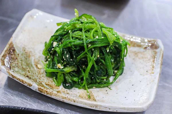 bó xôi trộn dầu mè